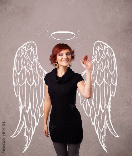 Photo: Cute girl with angel illustrated wings Cute girl with angel illustrated wings