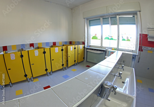 Photo: bathroom of a nursery with the wc and tiny sinks bathroom of a nursery with the wc and tiny sinks