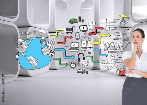 Photo: Composite image of pensive elegant businesswoman posing Composite image of pensive elegant businesswoman posing
