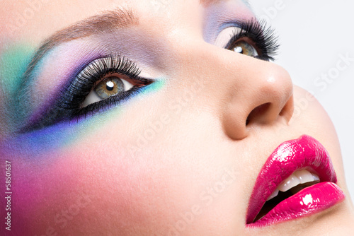 Photo: Beautiful woman with fashion bright makeup Beautiful woman with fashion bright makeup