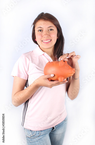 Photo: Woman with a piggybank Woman with a piggybank