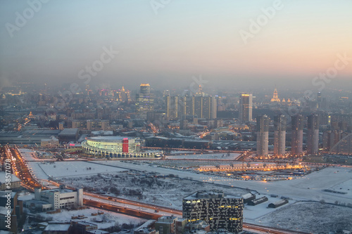 Photo: Evening cityscape with modern city buildings Evening cityscape with modern city buildings