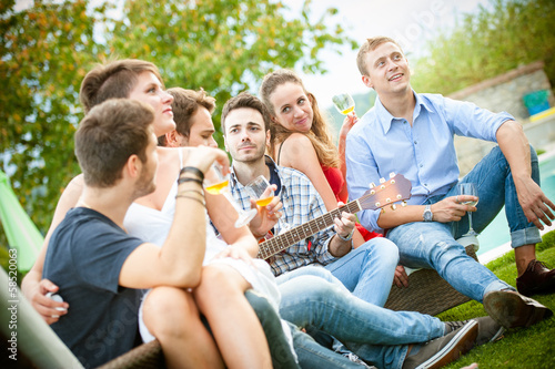 Photo: Friends enjoying at party Friends enjoying at party