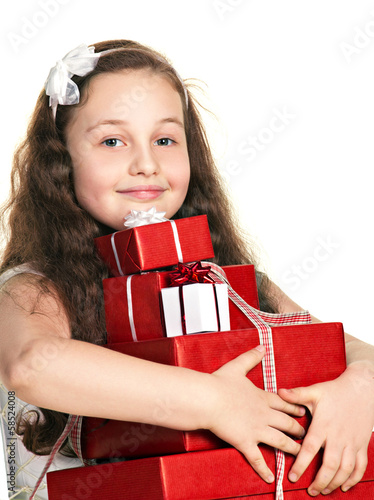 Photo: funny girl with gift boxes funny girl with gift boxes