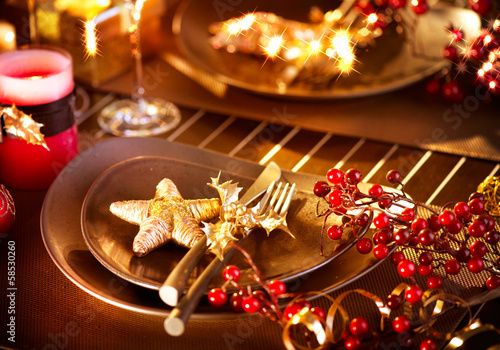 Photo: Christmas And New Year Holiday Table Setting. Celebration Christmas And New Year Holiday Table Setting. Celebration