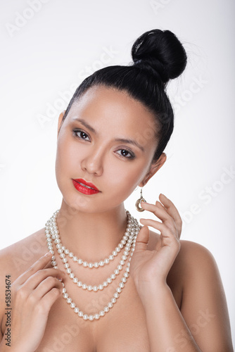Photo: Portrait of young asian girl in fashion style Portrait of young asian girl in fashion style