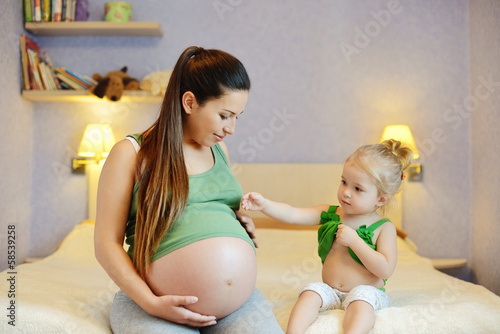Photo: mother and her baby daughter mother and her baby daughter