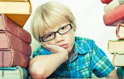 Photo: Boy with library books Boy with library books