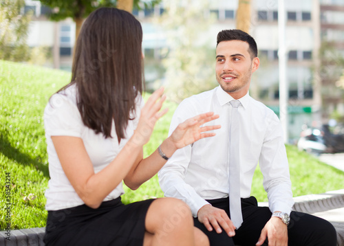 Photo: Business people talking outdoor Business people talking outdoor