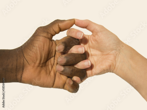 Photo: Mixity - Two joint hands symbolizing diversity Mixity - Two joint hands symbolizing diversity