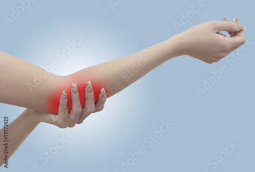 Photo: pPain in a woman elbow pPain in a woman elbow