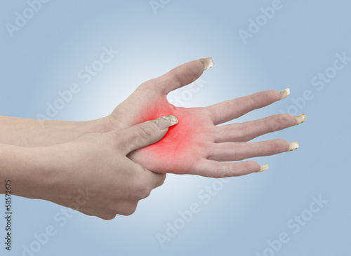 Photo: Pain in a woman palm Pain in a woman palm