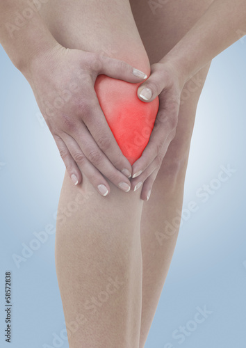 Photo: Acute pain in a woman knee Acute pain in a woman knee