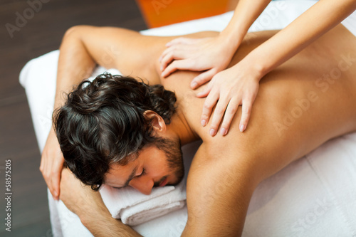 Photo: Man having a massage Man having a massage