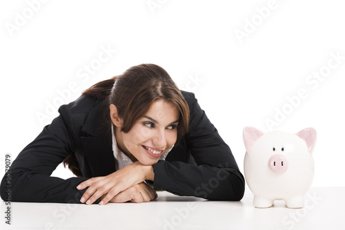 Photo: Businesswoman with a piggy bank Businesswoman with a piggy bank