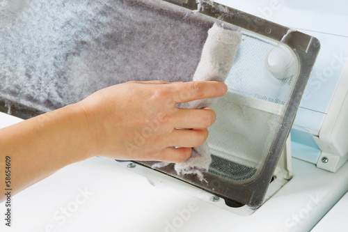 Photo: Taking the lent of Dryer Machine Taking the lent of Dryer Machine