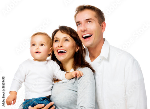 Photo: Happy Smiling Family Portrait isolated on White Happy Smiling Family Portrait isolated on White