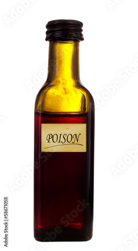 Photo: Old medicine bottle with poison label, isolated over white Old medicine bottle with poison label, isolated over white