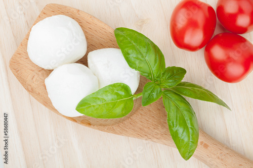 Photo: Mozzarella, tomatoes and basil Mozzarella, tomatoes and basil