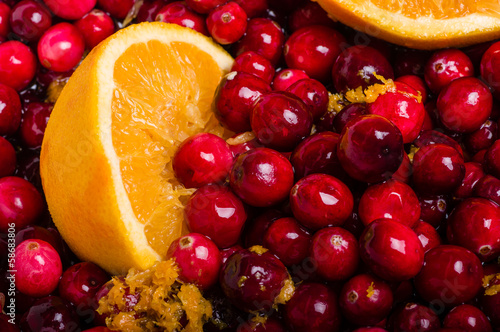Photo: Cranberries and orange making cranberry sauce Cranberries and orange making cranberry sauce