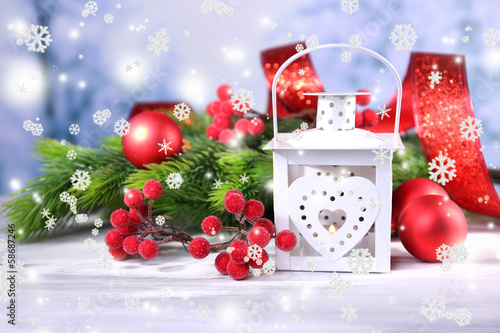 Photo: Composition with Christmas lantern, fir tree and decorations Composition with Christmas lantern, fir tree and decorations