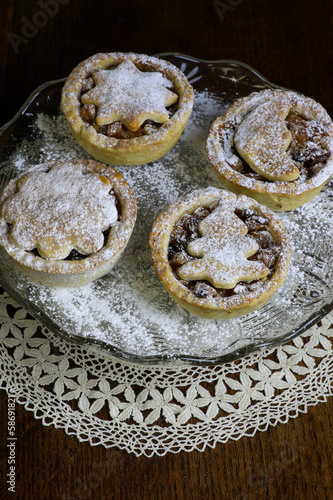 Photo: Traditional Mince Pies on glass stand Traditional Mince Pies on glass stand