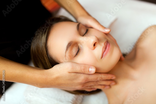 Photo: Beautiful woman having a massage Beautiful woman having a massage