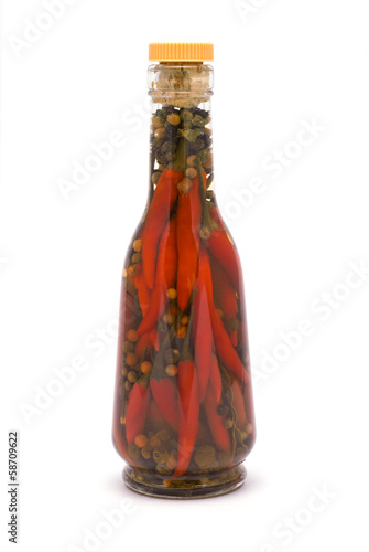 Photo: Chili Vinegar isolated on white Chili Vinegar isolated on white