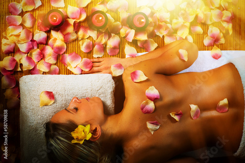 Photo: Beautiful woman having massage. Beautiful woman having massage.