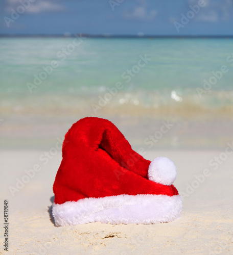 Photo: Santa's Hat on Beach Santa's Hat on Beach