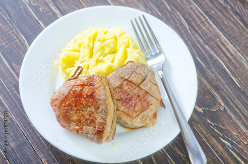 Photo: mashed potato and fried meat mashed potato and fried meat