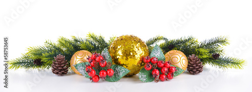 Photo: Composition of Christmas decorations isolated on white Composition of Christmas decorations isolated on white