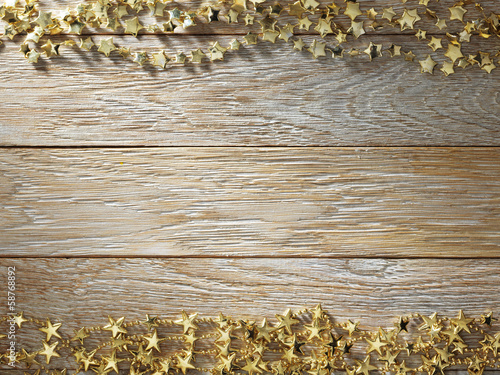 Photo: Christmas decoration on wood texture. background old panels Christmas decoration on wood texture. background old panels