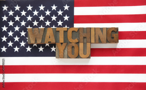 Photo: watching you in wood type on flag watching you in wood type on flag