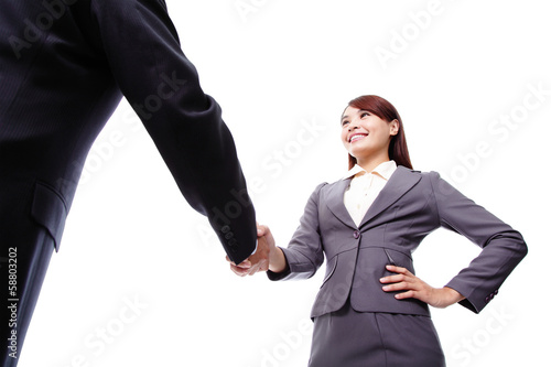 Photo: Business woman and man handshake Business woman and man handshake