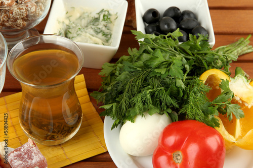 Photo: Traditional Turkish breakfast on table close up Traditional Turkish breakfast on table close up