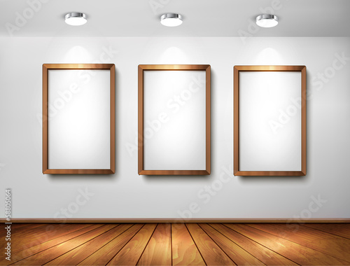 Vector: Empty wooden frames on wall with spotlights and wooden floor. Ve Empty wooden frames on wall with spotlights and wooden floor. Ve