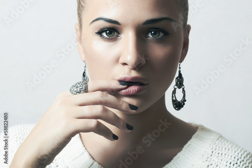 Photo: Beautiful woman.Jewelry and Beauty.manicure.tender Beautiful woman.Jewelry and Beauty.manicure.tender