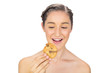 Greedy young model holding cookie Greedy young model holding cookie