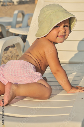 Photo: cute baby on the beach cute baby on the beach