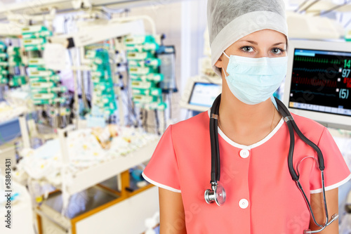 Photo: Female doctor in pediatric ER. Female doctor in pediatric ER.