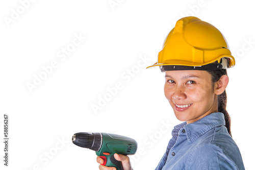 Photo: Asian female construction worker with safety hat and drill Asian female construction worker with safety hat and drill