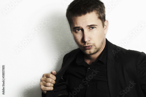 Photo: Fashion handsome man business suit and black shirt.casual Fashion handsome man business suit and black shirt.casual