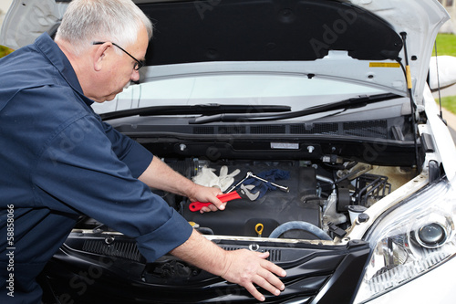 Photo: Car mechanic. Car mechanic.