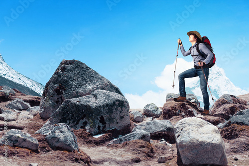Photo: Young tourist atop of mountain Young tourist atop of mountain