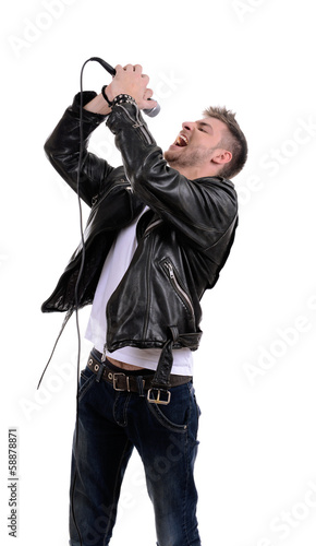 Photo: Young musician singing, isolated on white Young musician singing, isolated on white