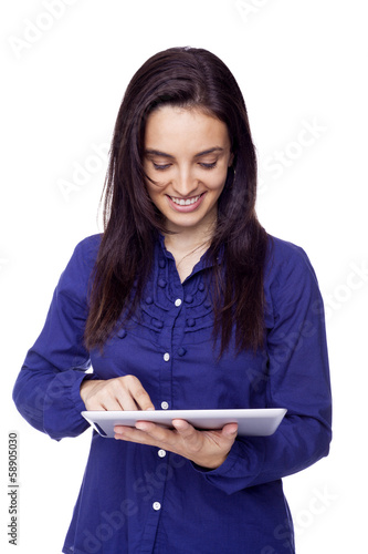 Photo: Smiling woman with tablet computer isolated on white background Smiling woman with tablet computer isolated on white background