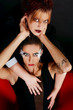 Fashion portrait of a woman and androgynus man Fashion portrait of a woman and androgynus man