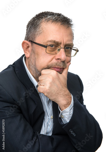 Photo: Portrait of senior businessman in a black jacket Portrait of senior businessman in a black jacket