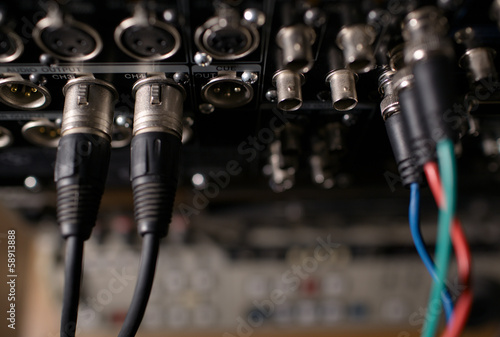 Photo: Rear panel of the professional recorder with cables. Rear panel of the professional recorder with cables.